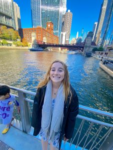 Lila Slattery on bridge crossing the Chicago River.